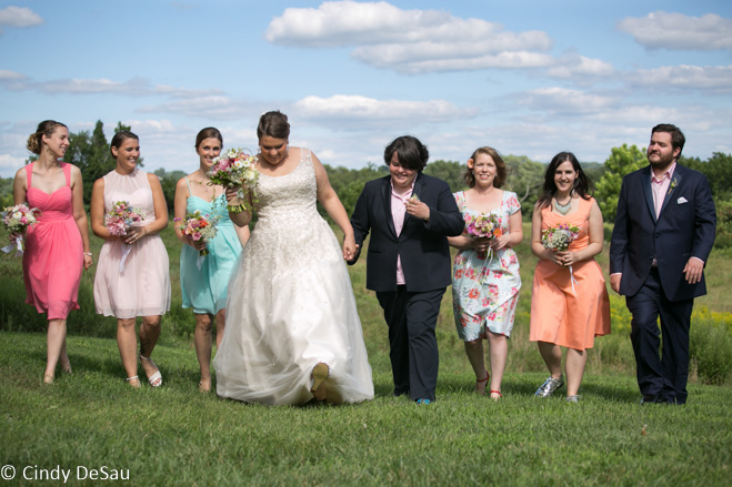 the entire bridal party walk up the hill. 