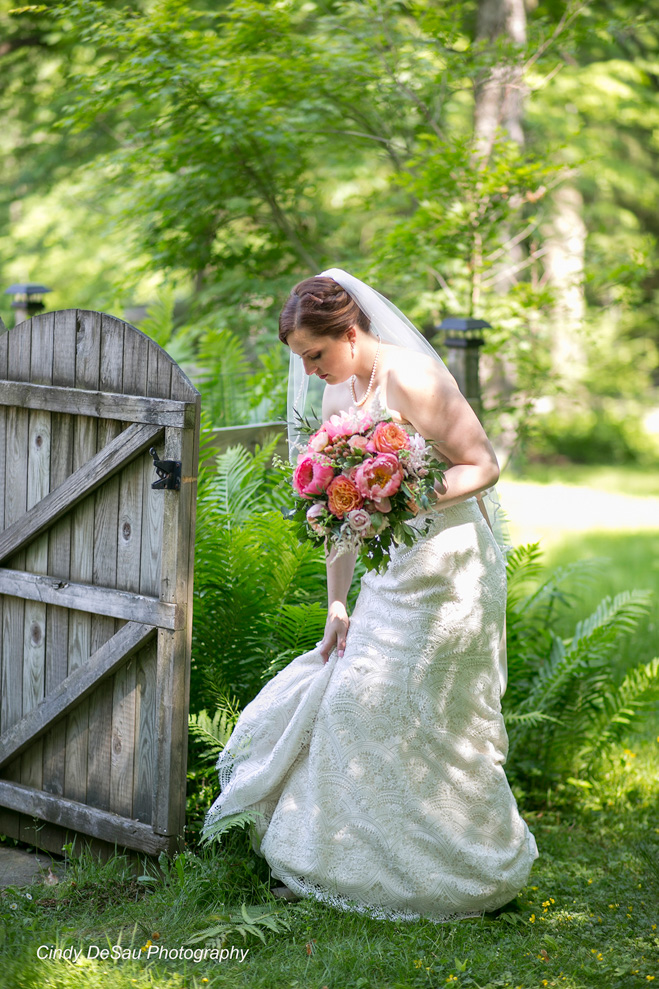 bride by the garden gate