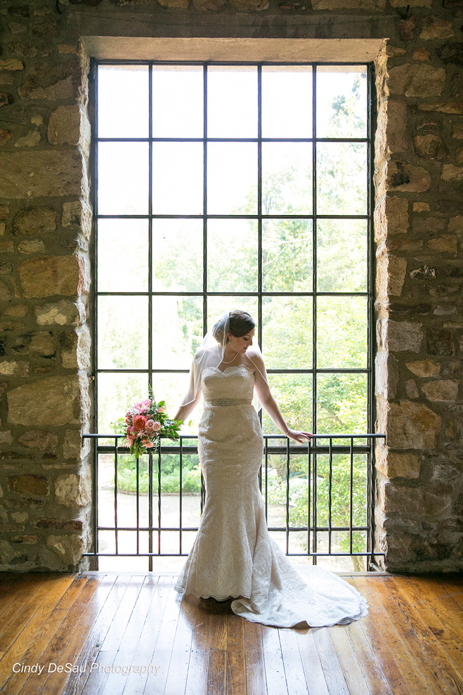 bride full length in front of window