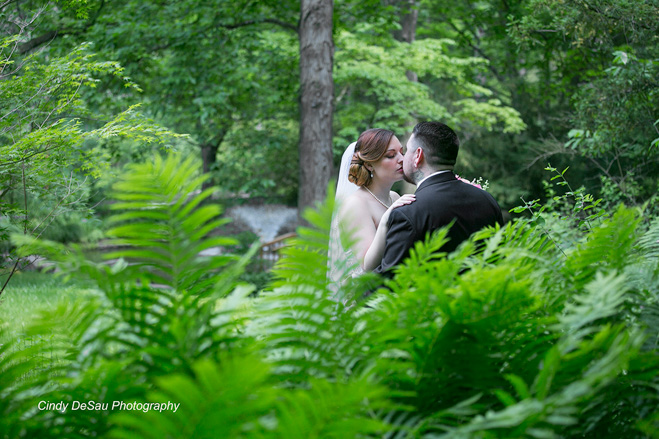 A bridal kiss in the ferns