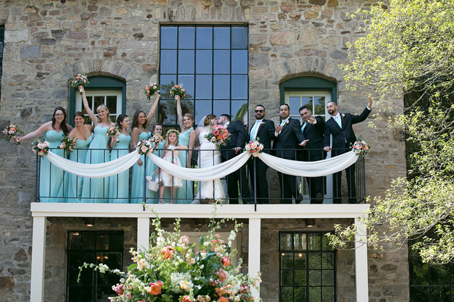 bridal party on the balony