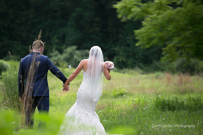 bride and groom walk away