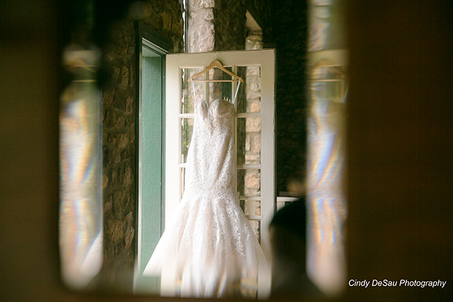 bride's wedding dress reflected 